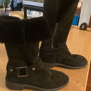 Boots-UGG beautiful black sheepskin easy zipped entry and buckle.  Size 5.
